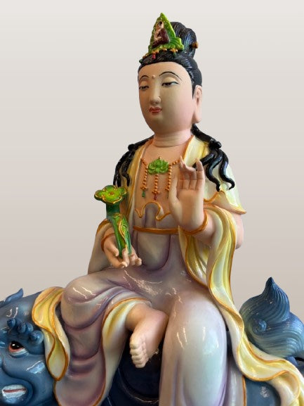 Porcelain Seated Quan Yin on Lion 11"