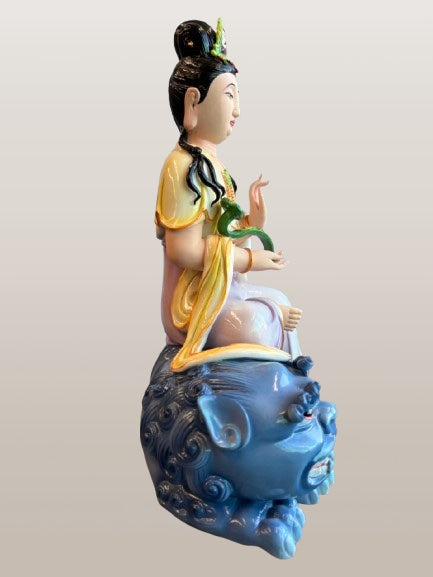 Porcelain Seated Quan Yin on Lion 11"