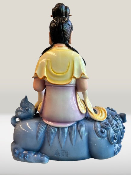 Porcelain Seated Quan Yin on Lion 11"