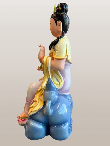 Porcelain Seated Quan Yin on Lion 11"