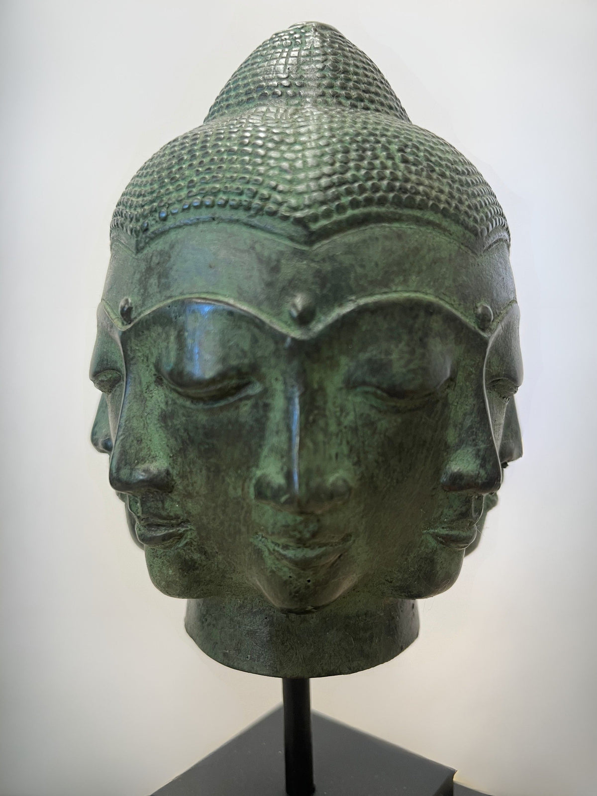 Eight Face Brass Buddha Head on Stand 9.5"