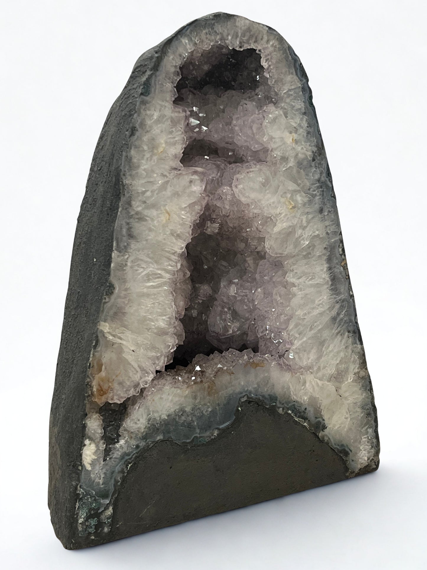 Geode with crystal formation on a white background