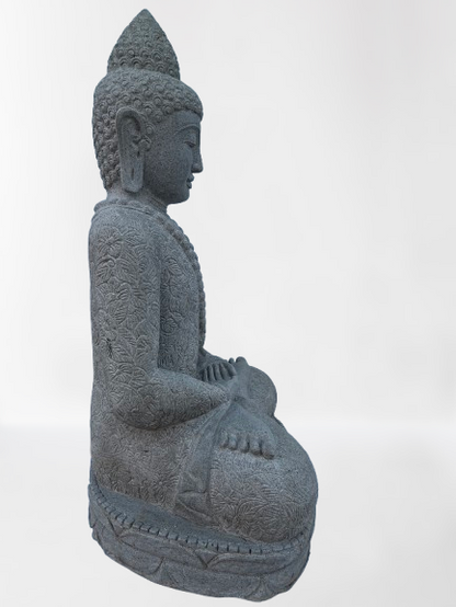 Stone statue of a seated Buddha on a white background