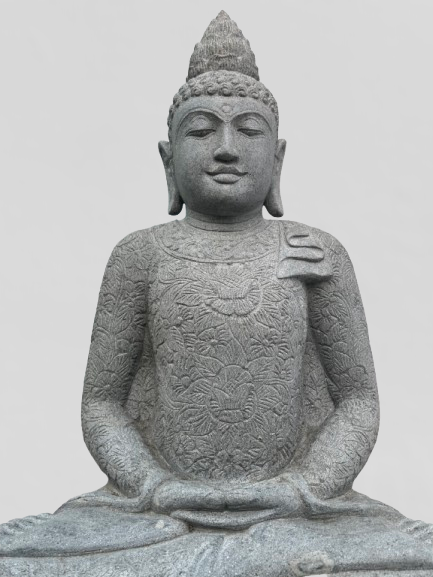 Stone statue of a seated Buddha on a plain background