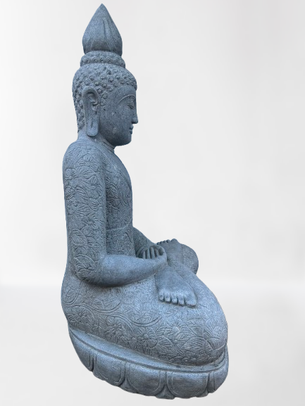 Stone statue of a seated Buddha on a white background