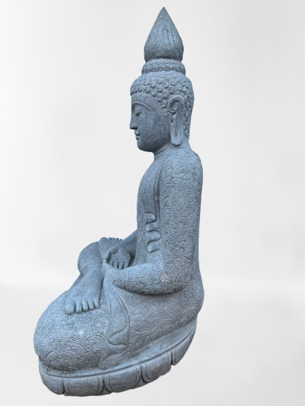 Stone sculpture of a seated Buddha figure on a white background