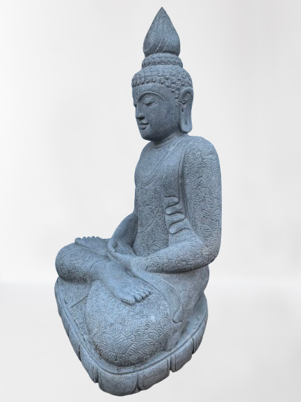 Stone statue of a seated Buddha on a white background