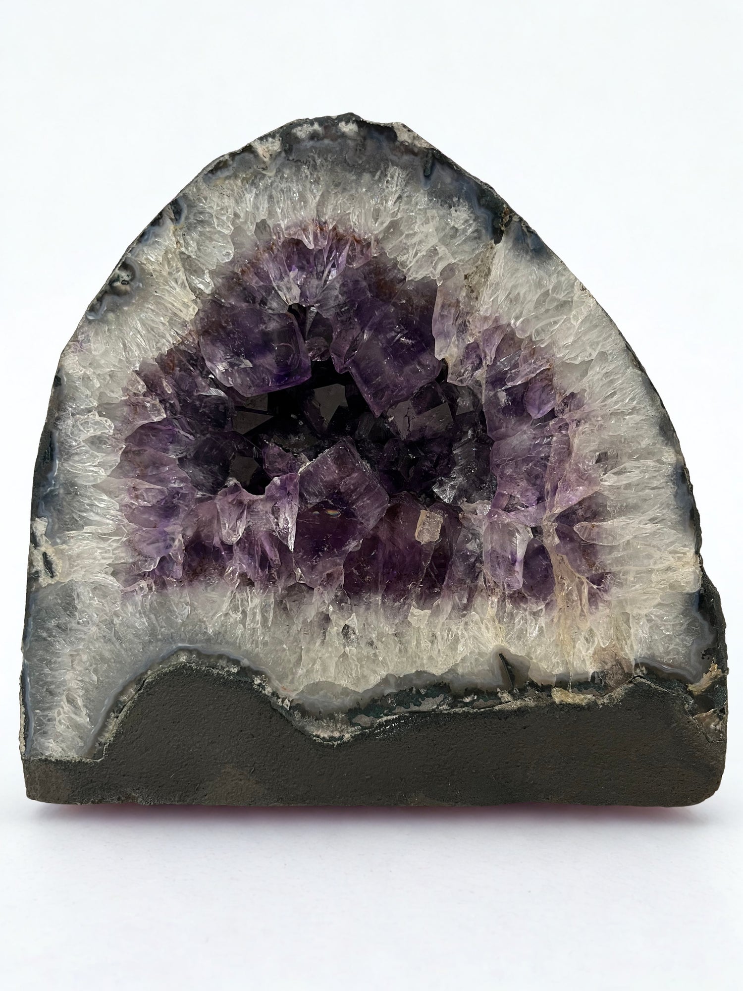 Amethyst geode on a white background