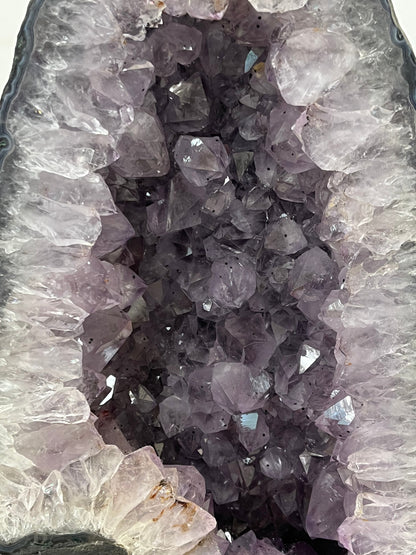 Close-up of amethyst crystals in a geode