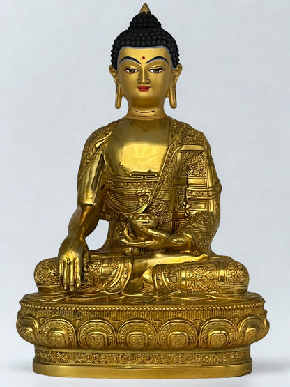 Gold-colored Earth Witness Buddha statue on a white background