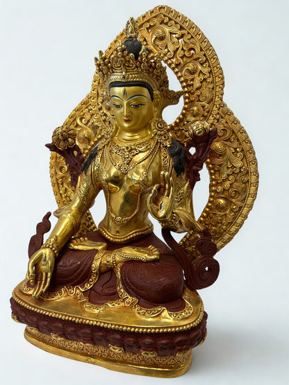White Tara brass statue 12 inch handcrafted seated in lotus posture with radiant lotus halo, gold tone finish, detailed crown, robes and sacred jewelry, seven eyes symbolism, Buddhist goddess of compassion healing wisdom and long life, spiritual altar decor for meditation yoga and sacred home spaces